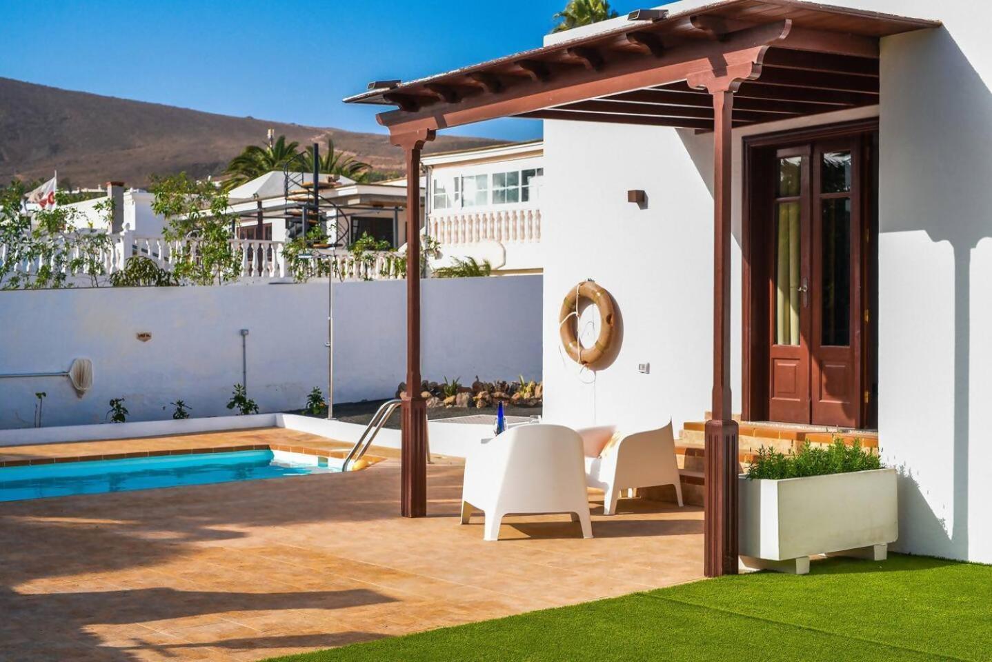 Agradable Y Familiar Con Piscina Casa Inima Villa Playa Blanca  Luaran gambar